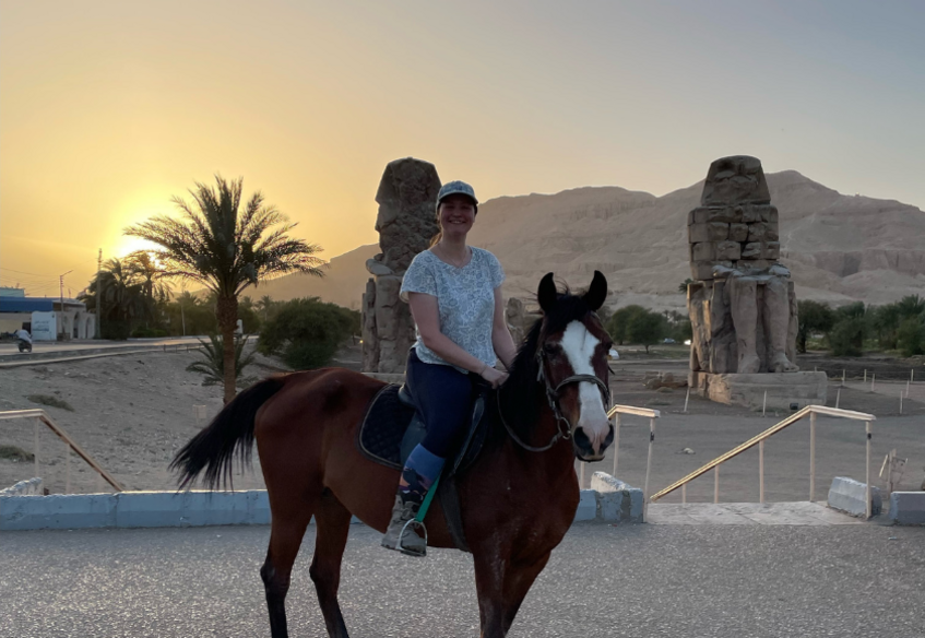 Women on Horse in Front of Egyptian Monuments in Sunset